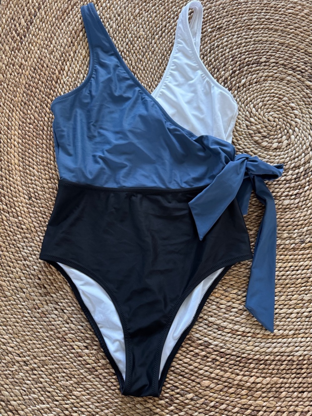 Woman’s One-Piece Swimsuit in Blue, Black & White with Side Tie